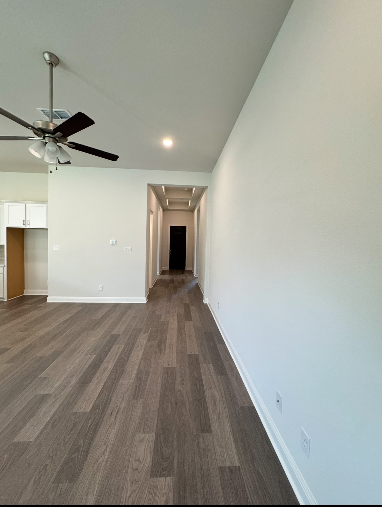 528 Tubman Drive Kyle, TX 78640 - Photo 21 of 27 a view of empty room with wooden floor