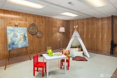 a room with furniture and curtain