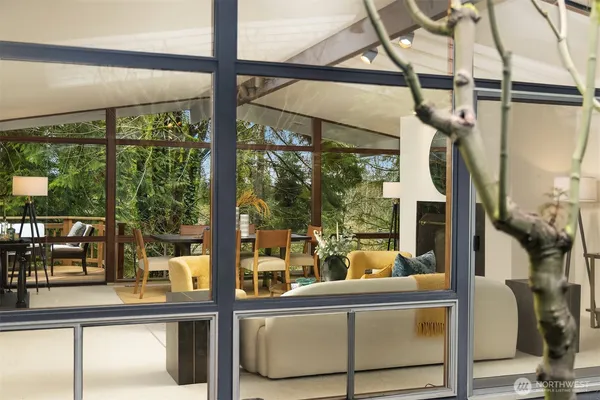 a view of living room with furniture and windows