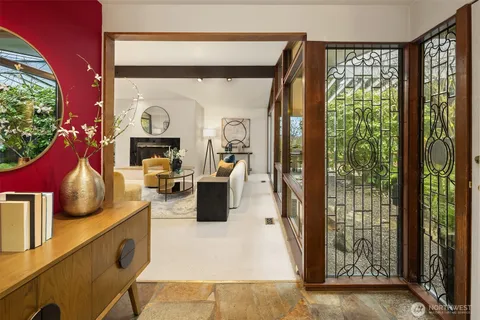 a view of living room with furniture and garden view