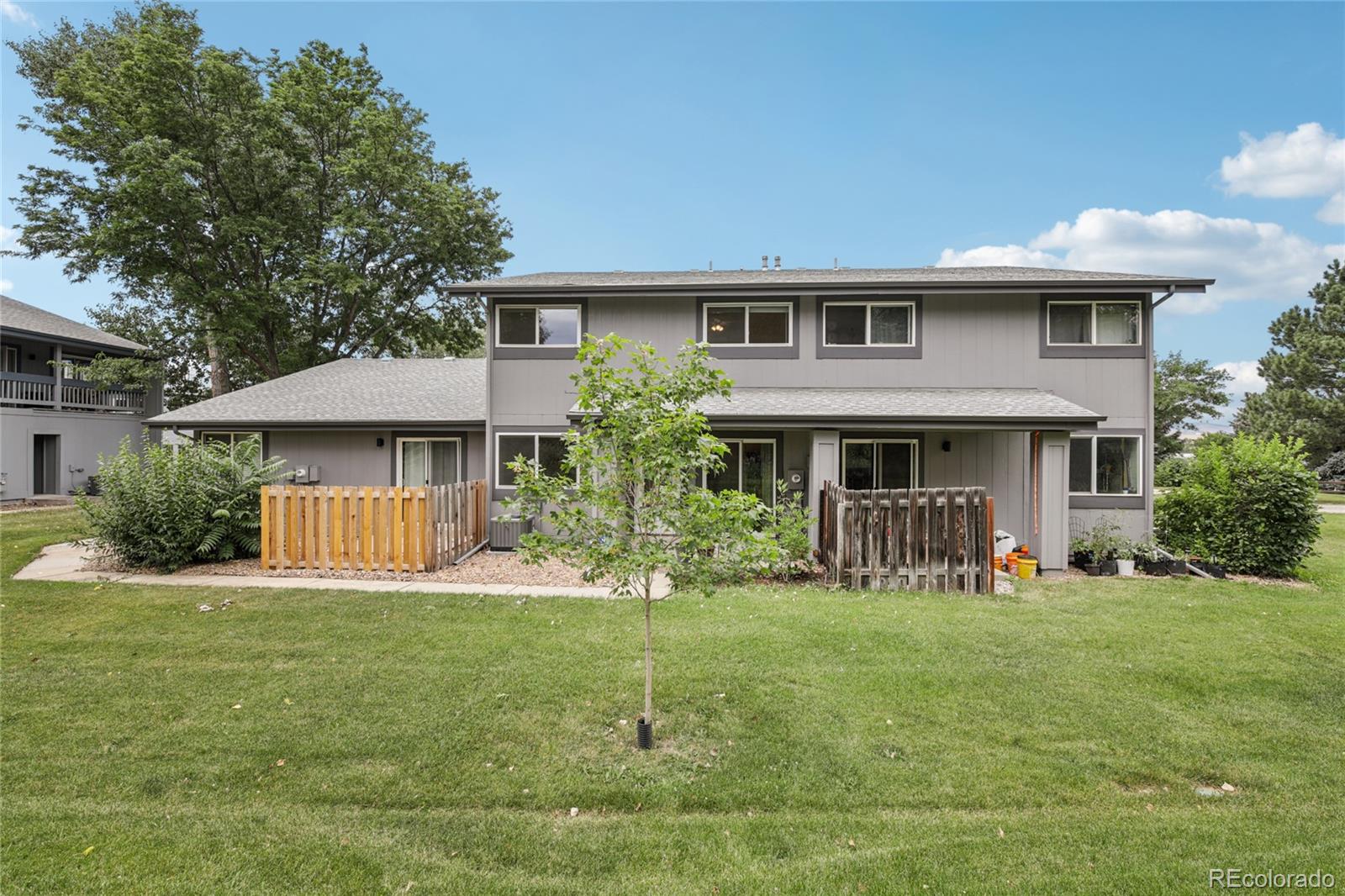 1169 Monroe Drive, Unit B Boulder, CO 80303 - Photo 24 of 32 a front view of a house with a yard
