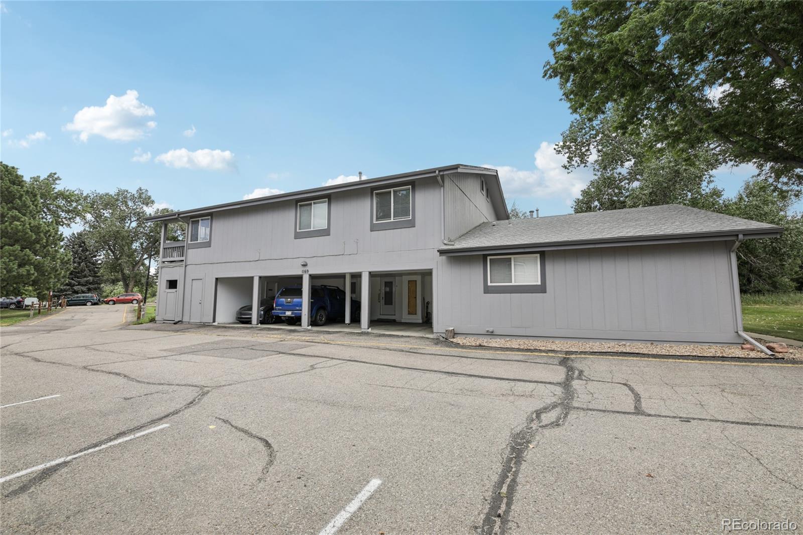 1169 Monroe Drive, Unit B Boulder, CO 80303 - Photo 30 of 32 a front view of a house with a garage
