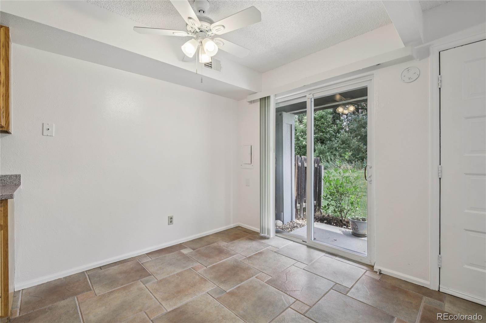 1169 Monroe Drive, Unit B Boulder, CO 80303 - Photo 8 of 32 a view of an empty room with a window