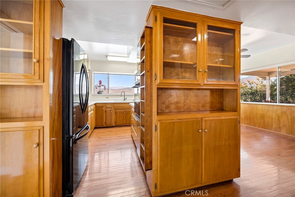 26320 Rim Road Hemet, CA 92544 - Photo 16 of 50 a view of a porch with wooden floor and a large window