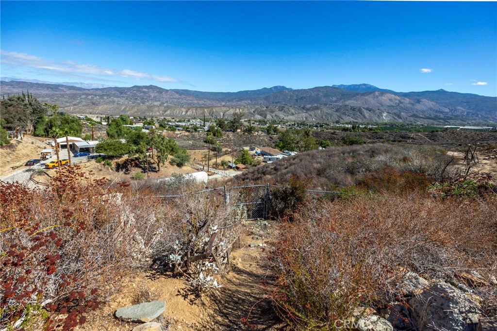 26320 Rim Road Hemet, CA 92544 - Photo 36 of 50 a view of a town with mountains in the background