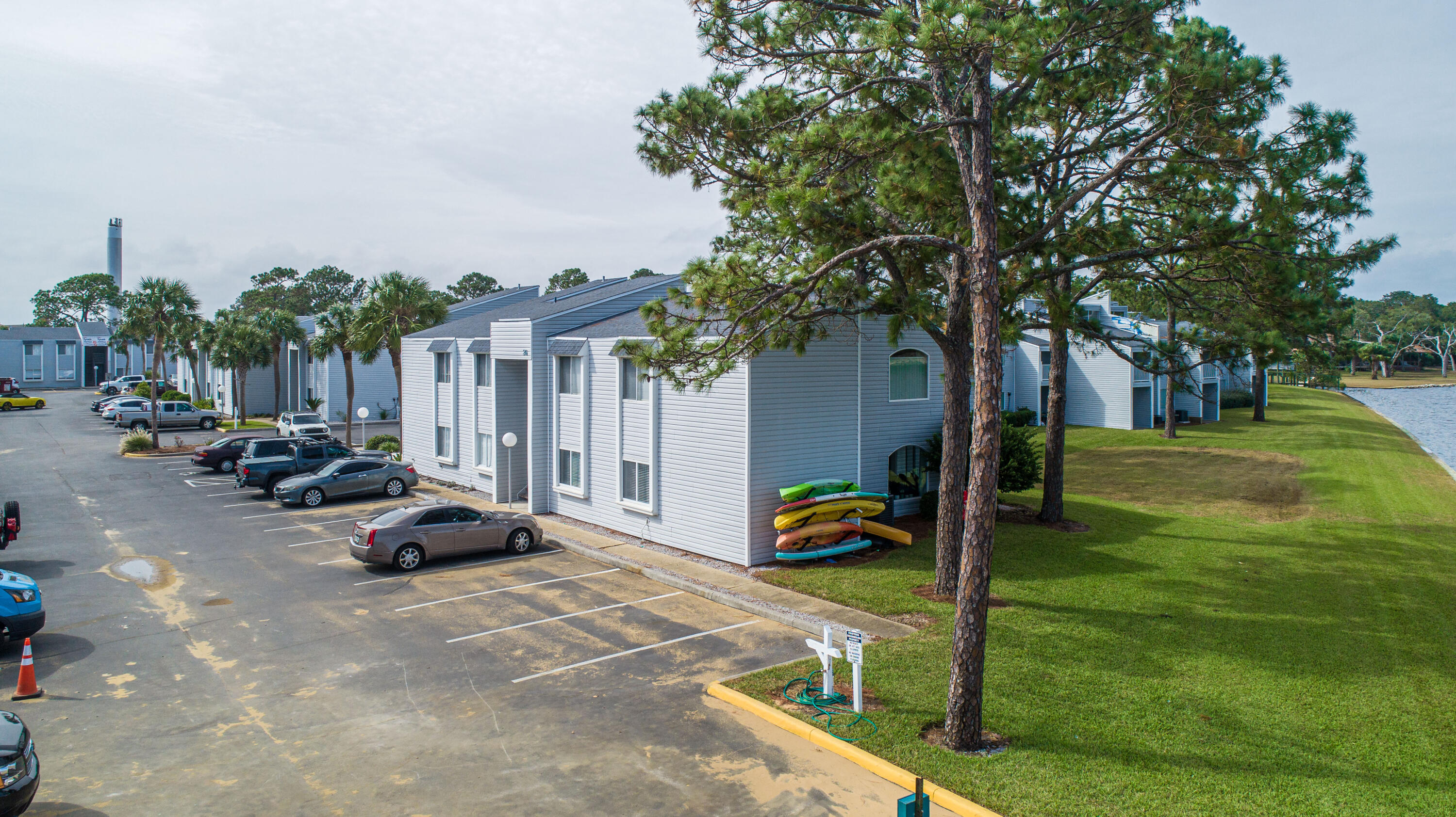 101 Old Ferry Road, Unit 26A Shalimar, FL 32579 - Photo 54 of 61 a view of yard with swimming pool and furniture
