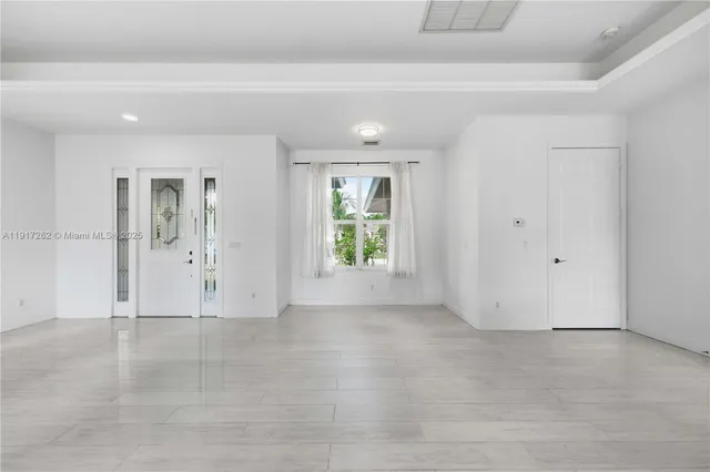 a view of an empty room with window