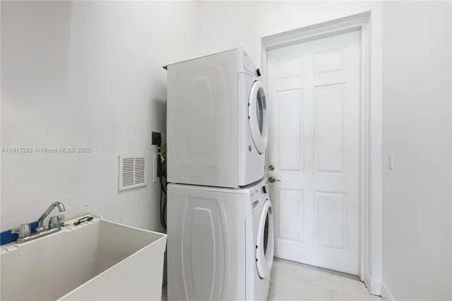 a bathroom with a tub and a shower