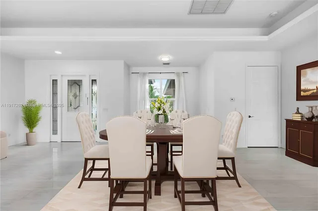 a view of a dining room with furniture