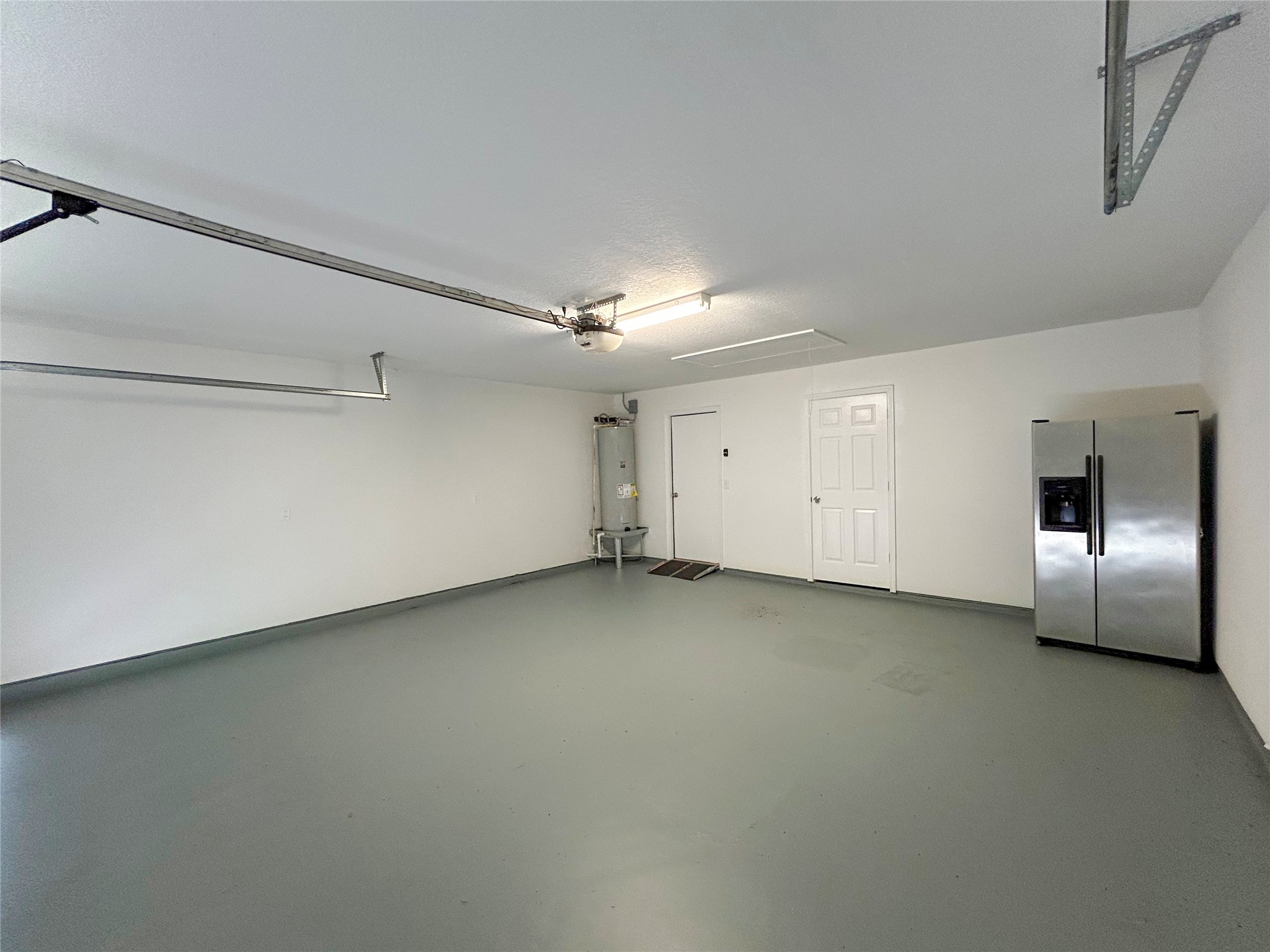 7902 Masters Manvel, TX 77578 - Photo 13 of 21 The attached garage provides convenient access