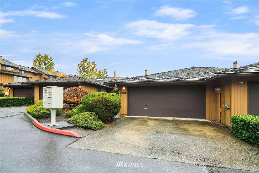 1523 Eagle Ridge Drive South, Unit 1N Renton, WA 98055 - Photo 1 of 21 front view of a house