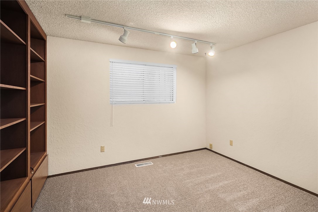 1523 Eagle Ridge Drive South, Unit 1N Renton, WA 98055 - Photo 13 of 21 a view of an empty room