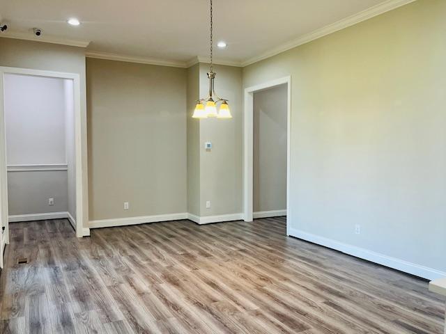 1717 Banks View Drive Raleigh, NC 27603 - Photo 15 of 33 an empty room with wooden floor and windows