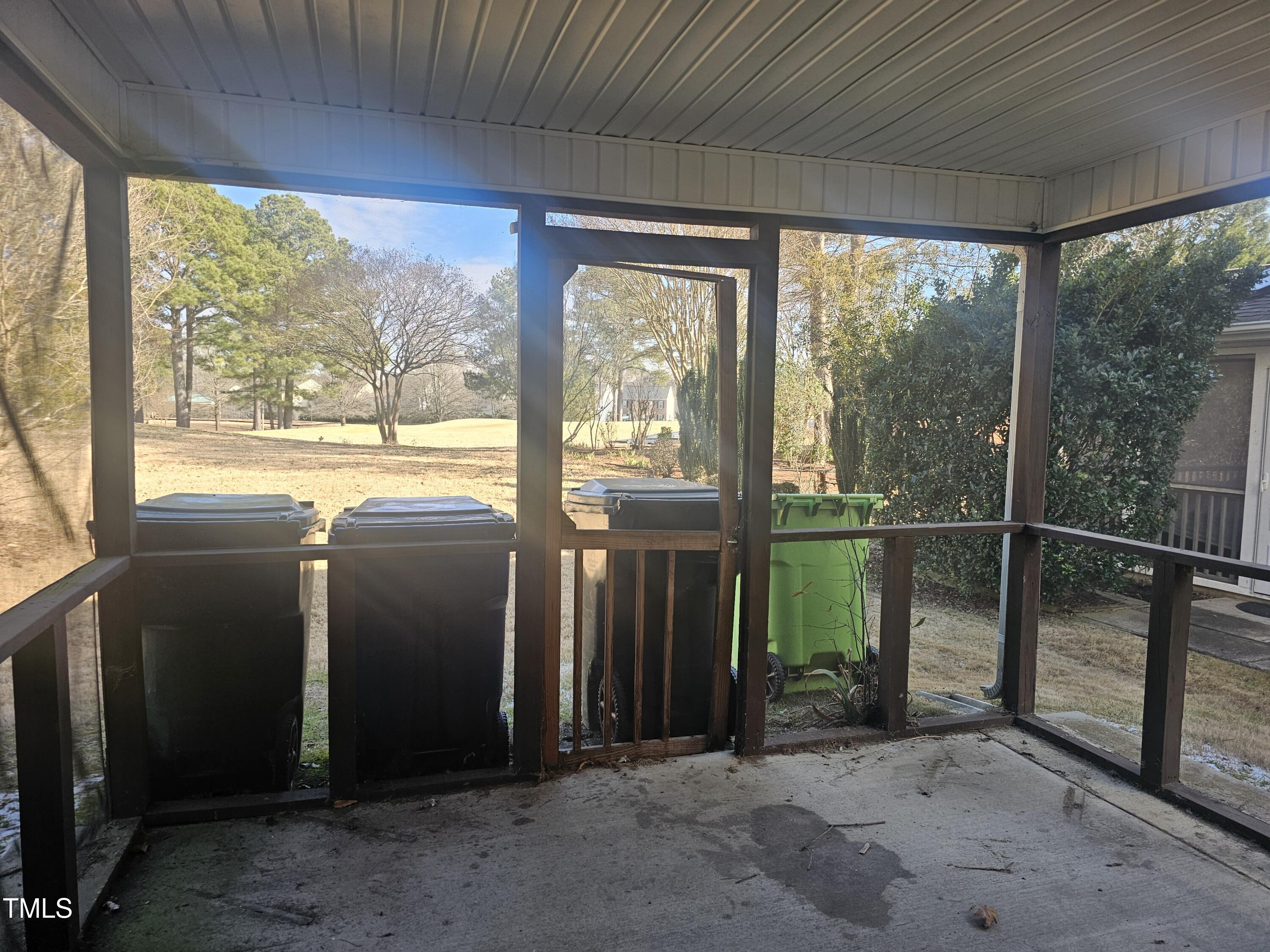2040 Persimmon Ridge Drive Raleigh, NC 27604 - Photo 18 of 28 a view of a room with sliding door and wooden floor