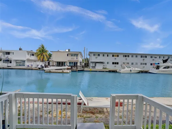 a view of a lake from a balcony