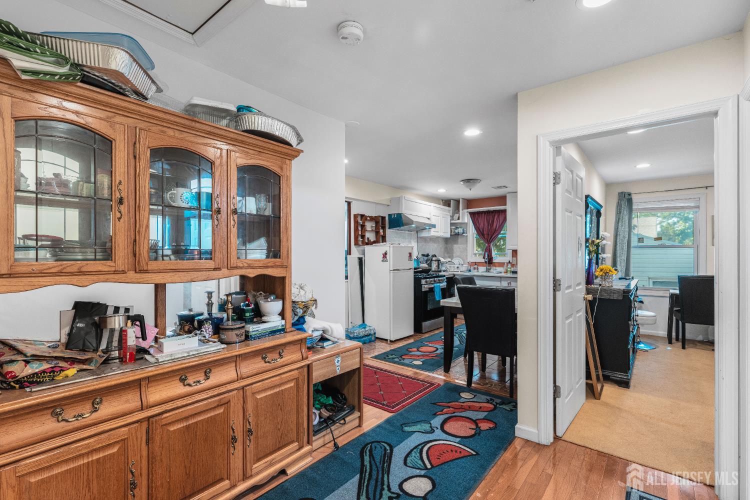 247 Adams Street Piscataway, NJ 08854 - Photo 12 of 49 a kitchen with stainless steel appliances granite countertop a refrigerator and a sink