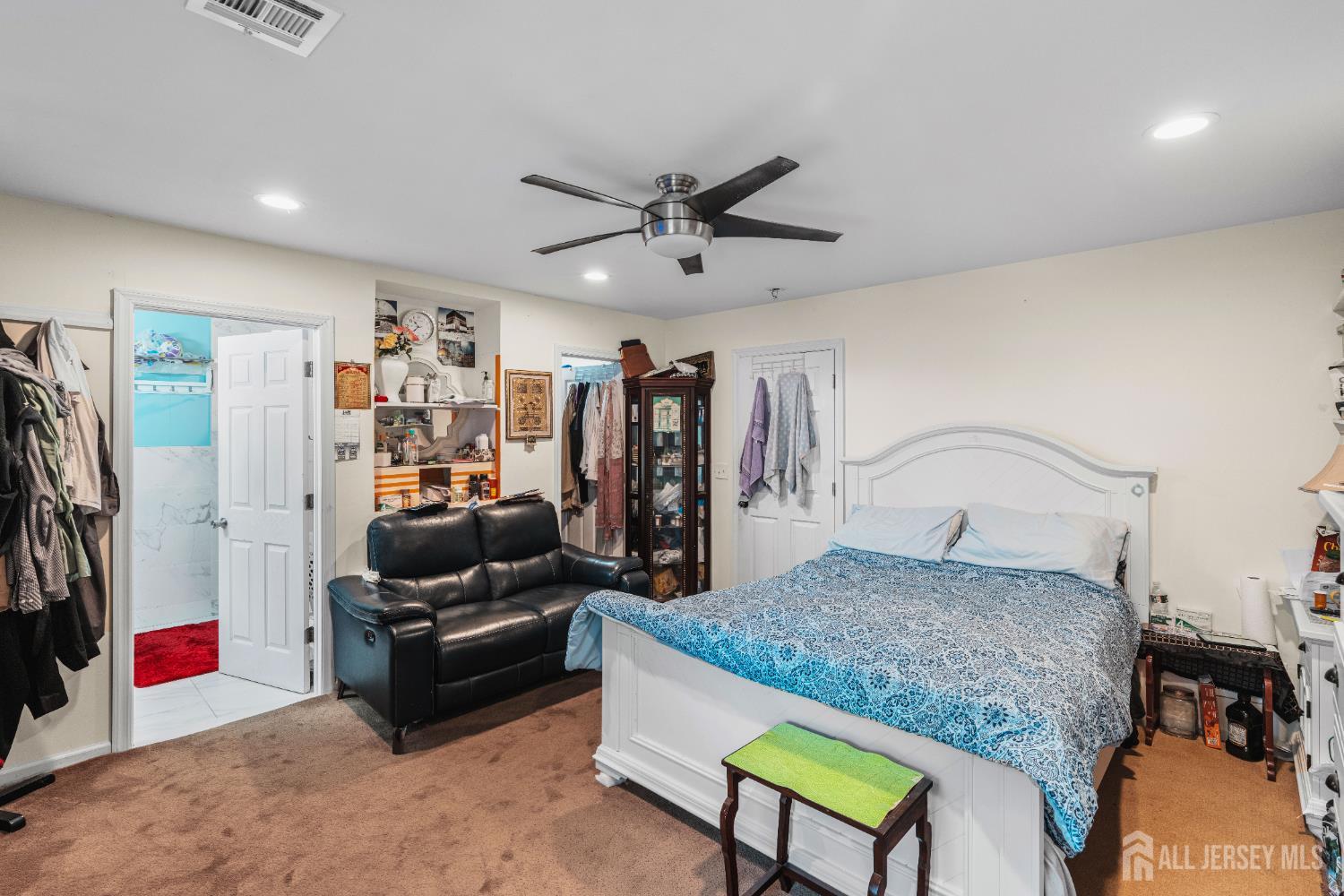 247 Adams Street Piscataway, NJ 08854 - Photo 14 of 49 a living room with furniture and a flat screen tv