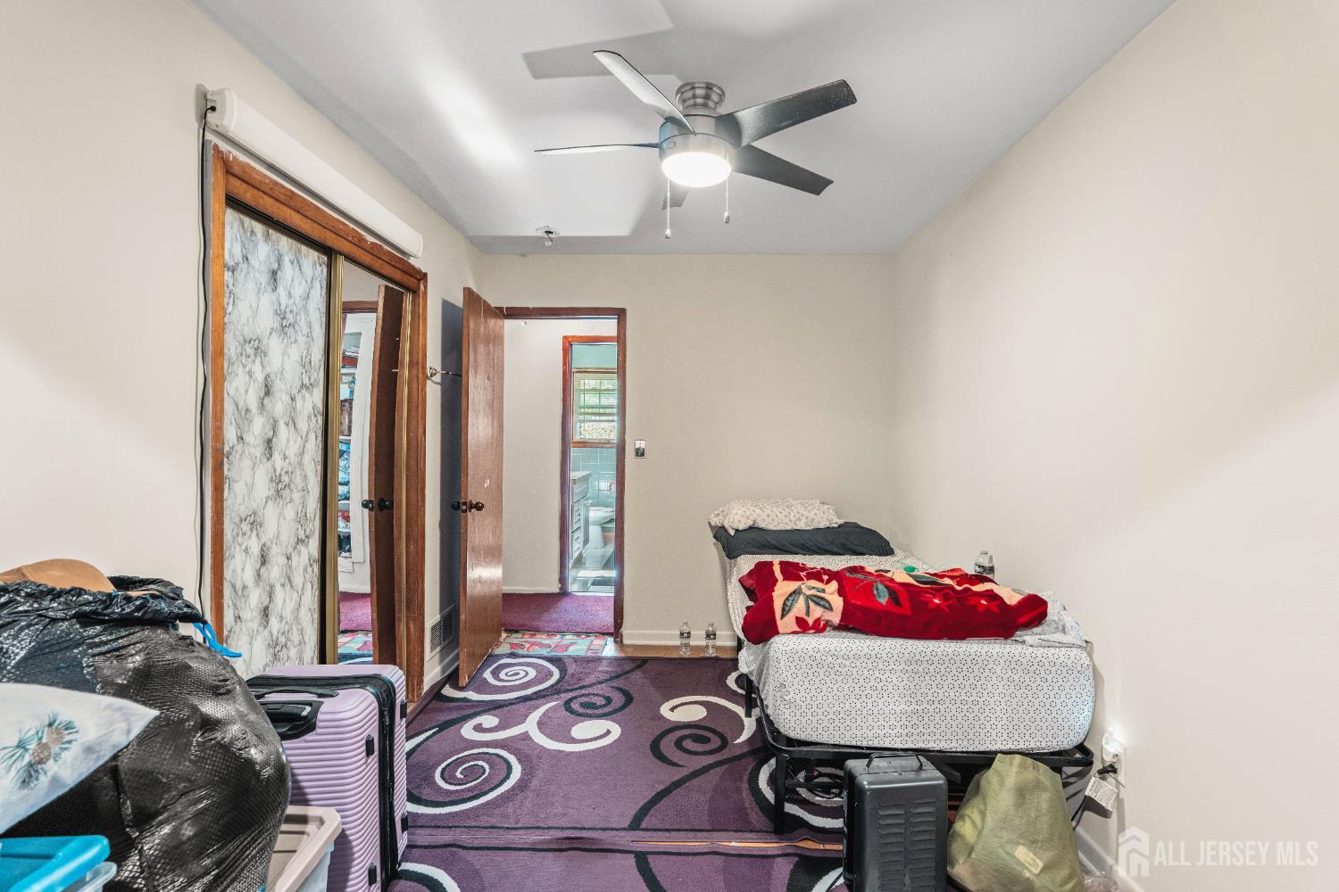 247 Adams Street Piscataway, NJ 08854 - Photo 16 of 49 a living room with furniture and two large window
