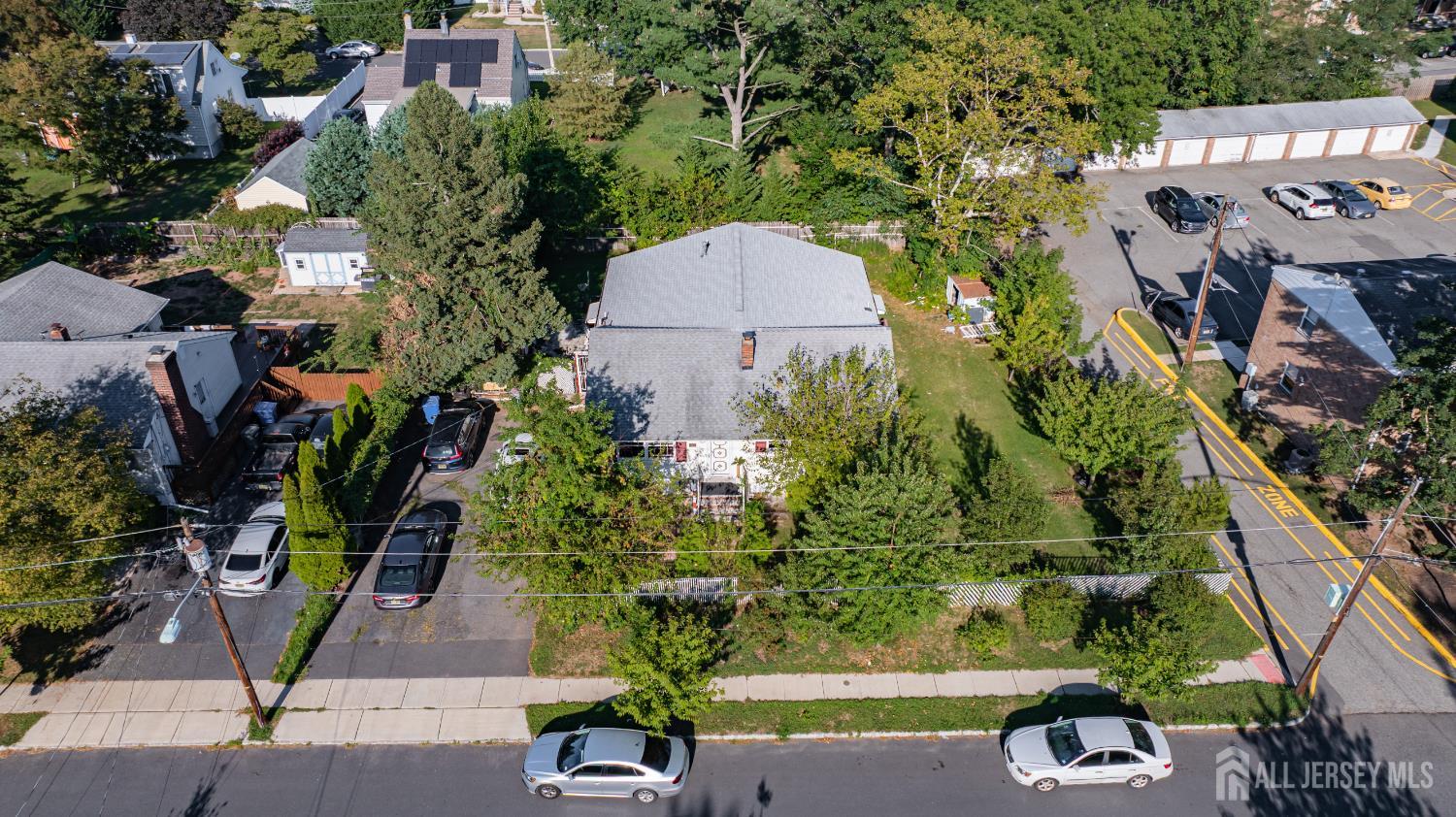 247 Adams Street Piscataway, NJ 08854 - Photo 38 of 49 an aerial view of a house with a yard basket ball court