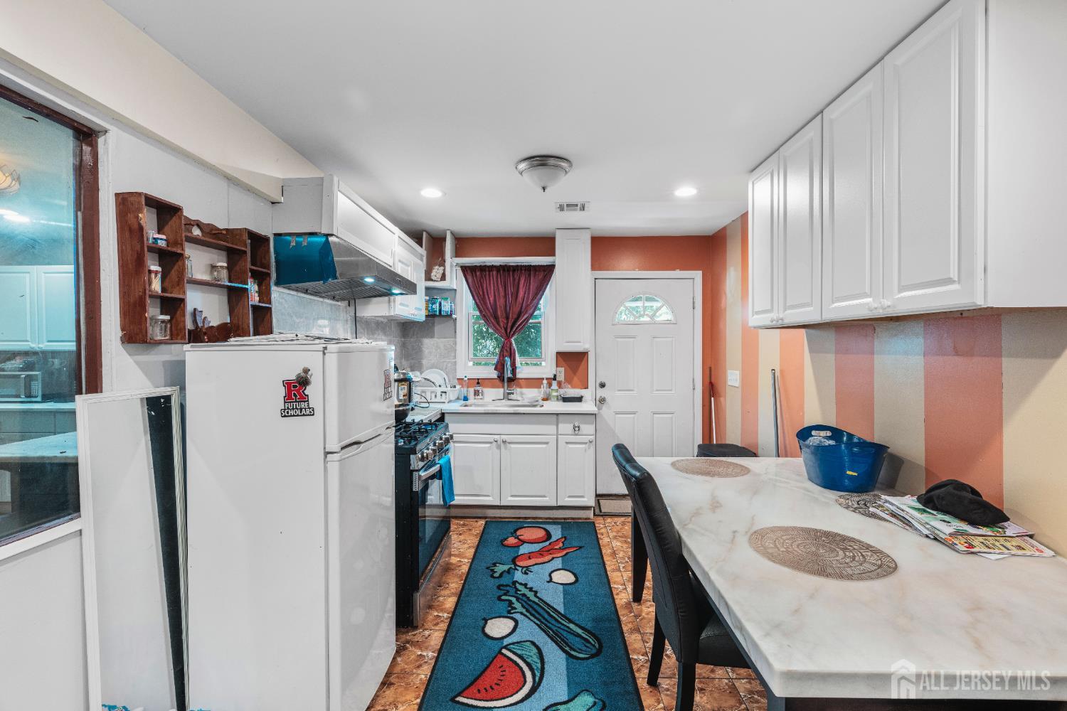 247 Adams Street Piscataway, NJ 08854 - Photo 9 of 49 a kitchen with granite countertop a sink appliances and cabinets