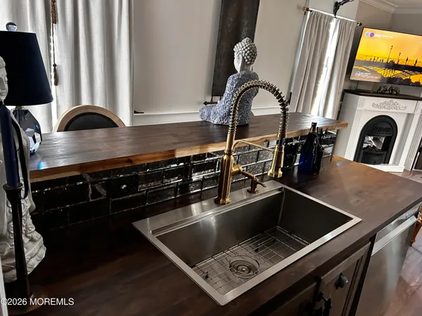 a view of livingroom with furniture and a flat screen tv