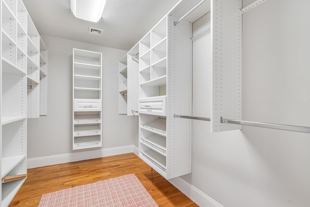 448 North Road Bedford, MA 01730 - Photo 14 of 22 a view of walk in closet with empty racks