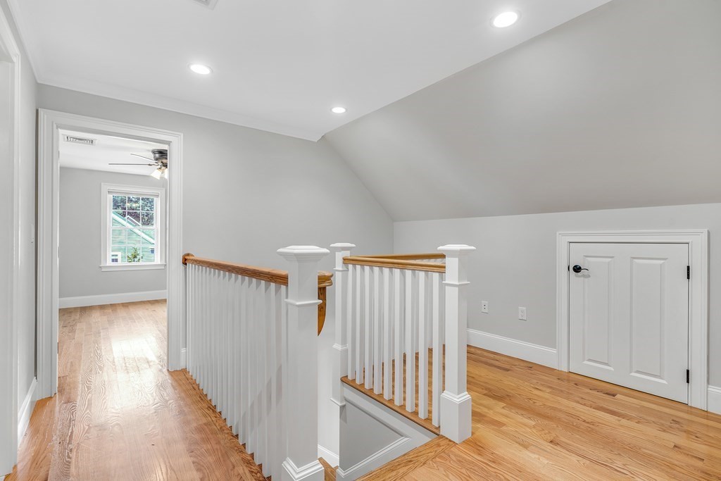 448 North Road Bedford, MA 01730 - Photo 16 of 22 a view of a hallway with wooden floor