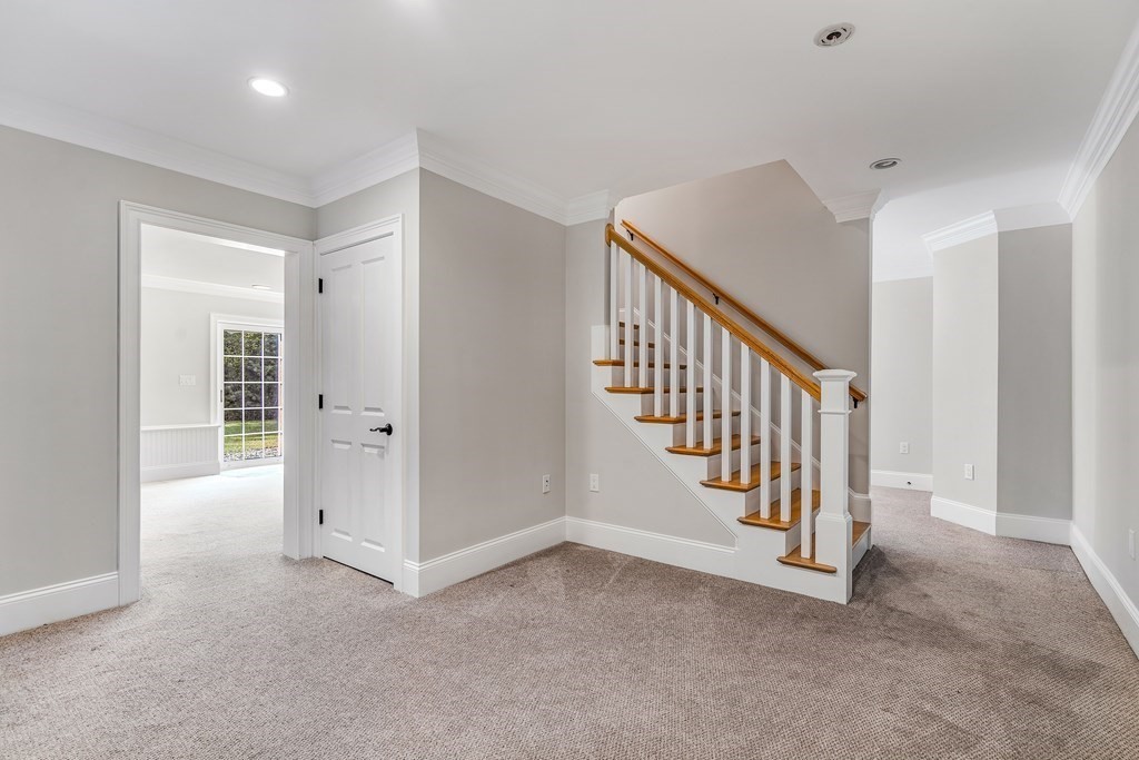 448 North Road Bedford, MA 01730 - Photo 20 of 22 a view of a hallway with stairs