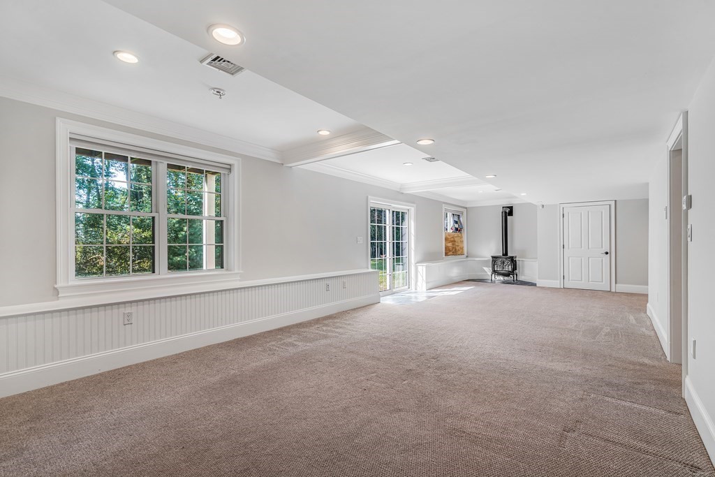 448 North Road Bedford, MA 01730 - Photo 21 of 22 a view of empty room with a window and fireplace