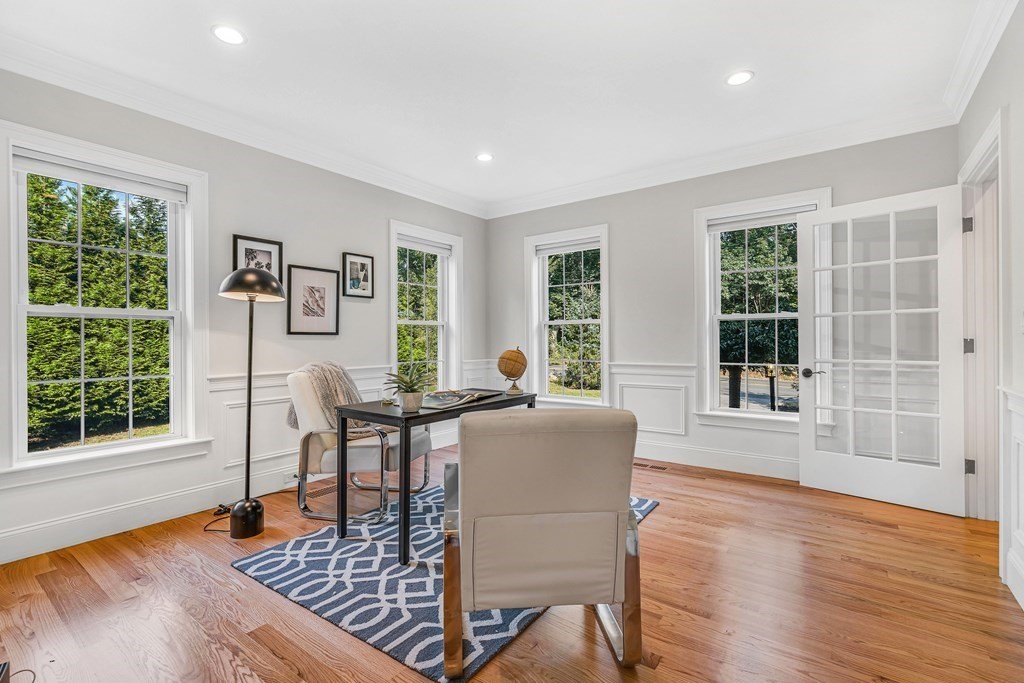 448 North Road Bedford, MA 01730 - Photo 3 of 22 a living room with furniture and wooden floor