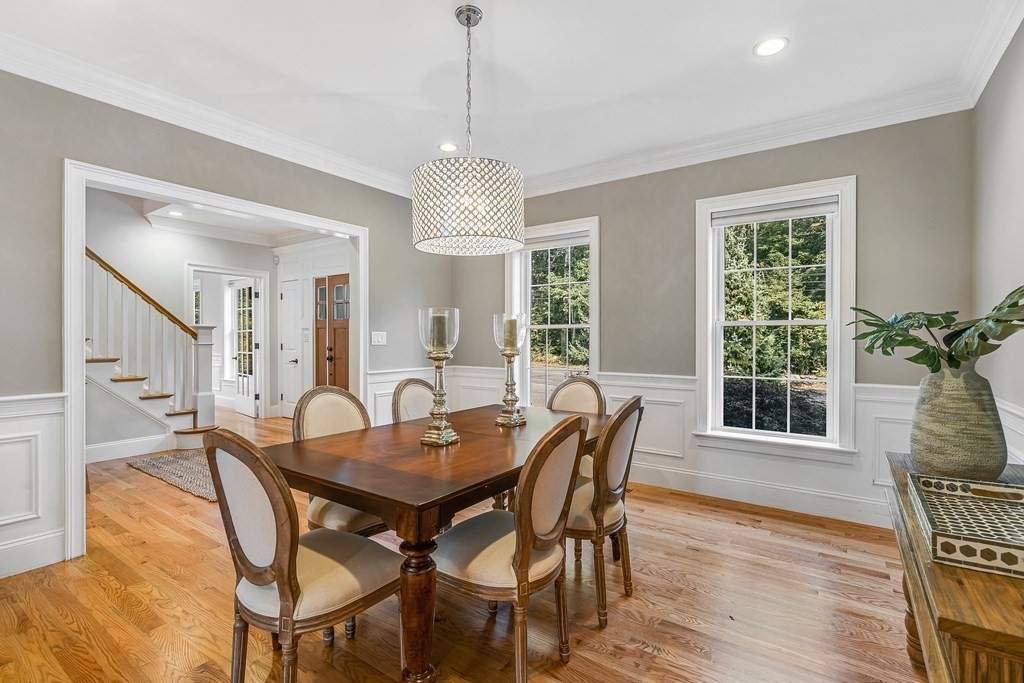 448 North Road Bedford, MA 01730 - Photo 4 of 22 a view of a dining room with furniture window and wooden floor