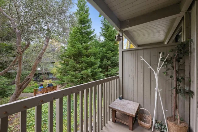 a view of a balcony with chair