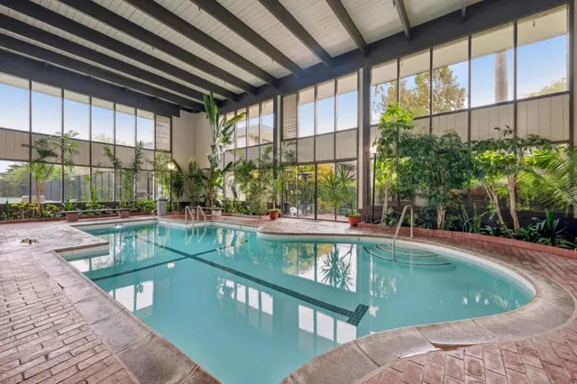 a view of swimming pool from a balcony