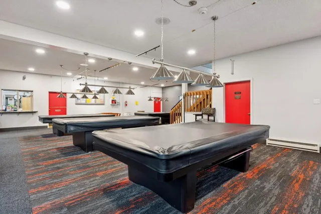 a room with furniture and wooden floor