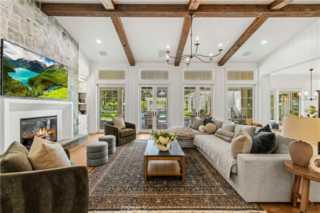 a media room with lots of chairs and a projector screen