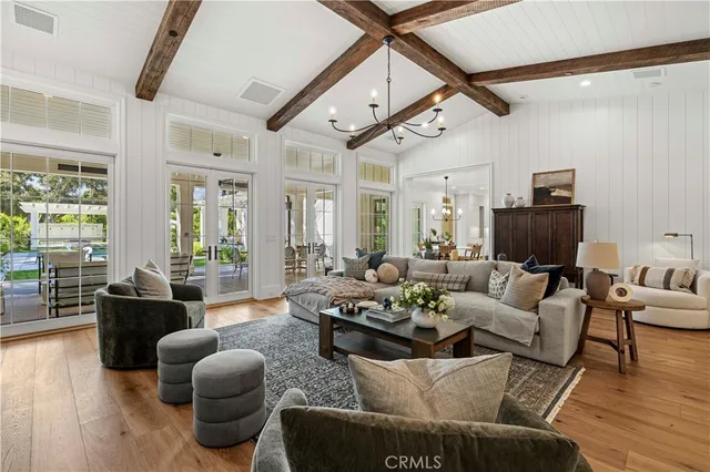 a bedroom with a large bed and a fireplace