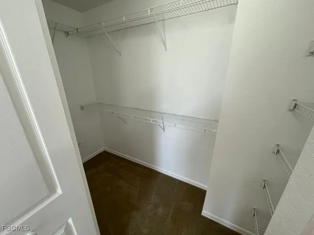 a view of small space with racks on the wall