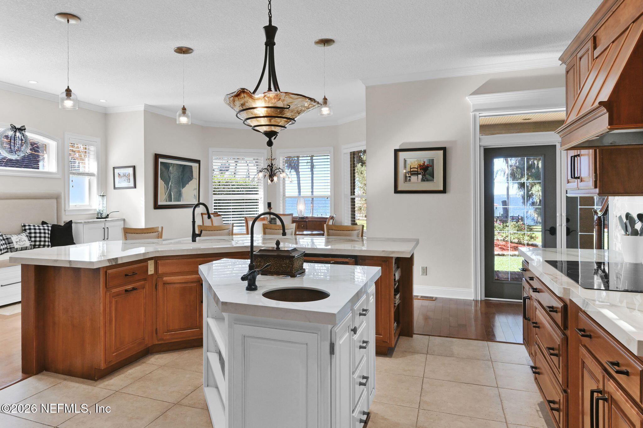 1050 Popolee Road St. Johns, FL 32259 - Photo 14 of 37 a kitchen with a sink a counter space and cabinets