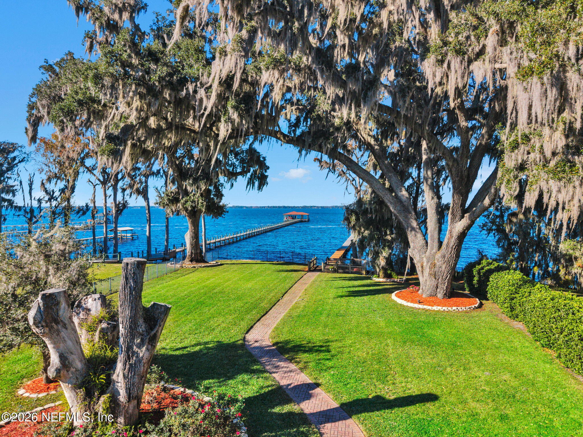 1050 Popolee Road St. Johns, FL 32259 - Photo 17 of 37 a view of a garden with large trees
