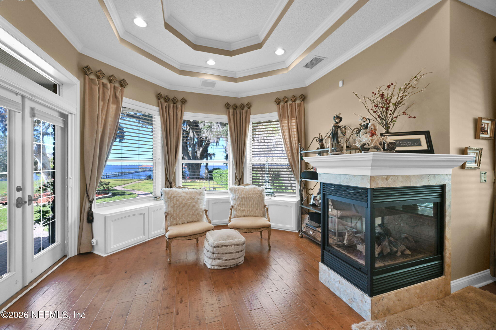 1050 Popolee Road St. Johns, FL 32259 - Photo 20 of 37 a living room with furniture and a fireplace