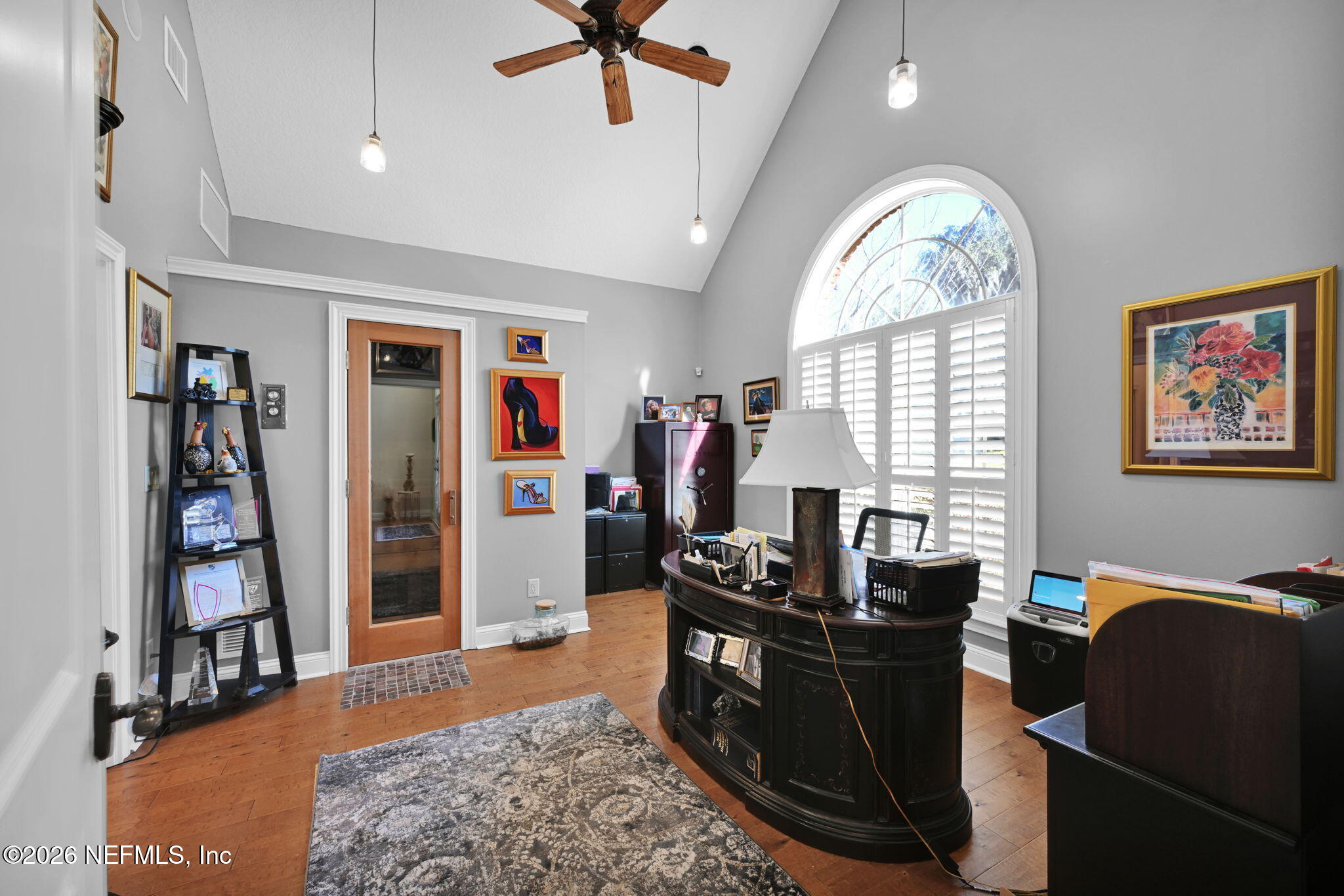 1050 Popolee Road St. Johns, FL 32259 - Photo 23 of 37 a livingroom with workspace window and a couch