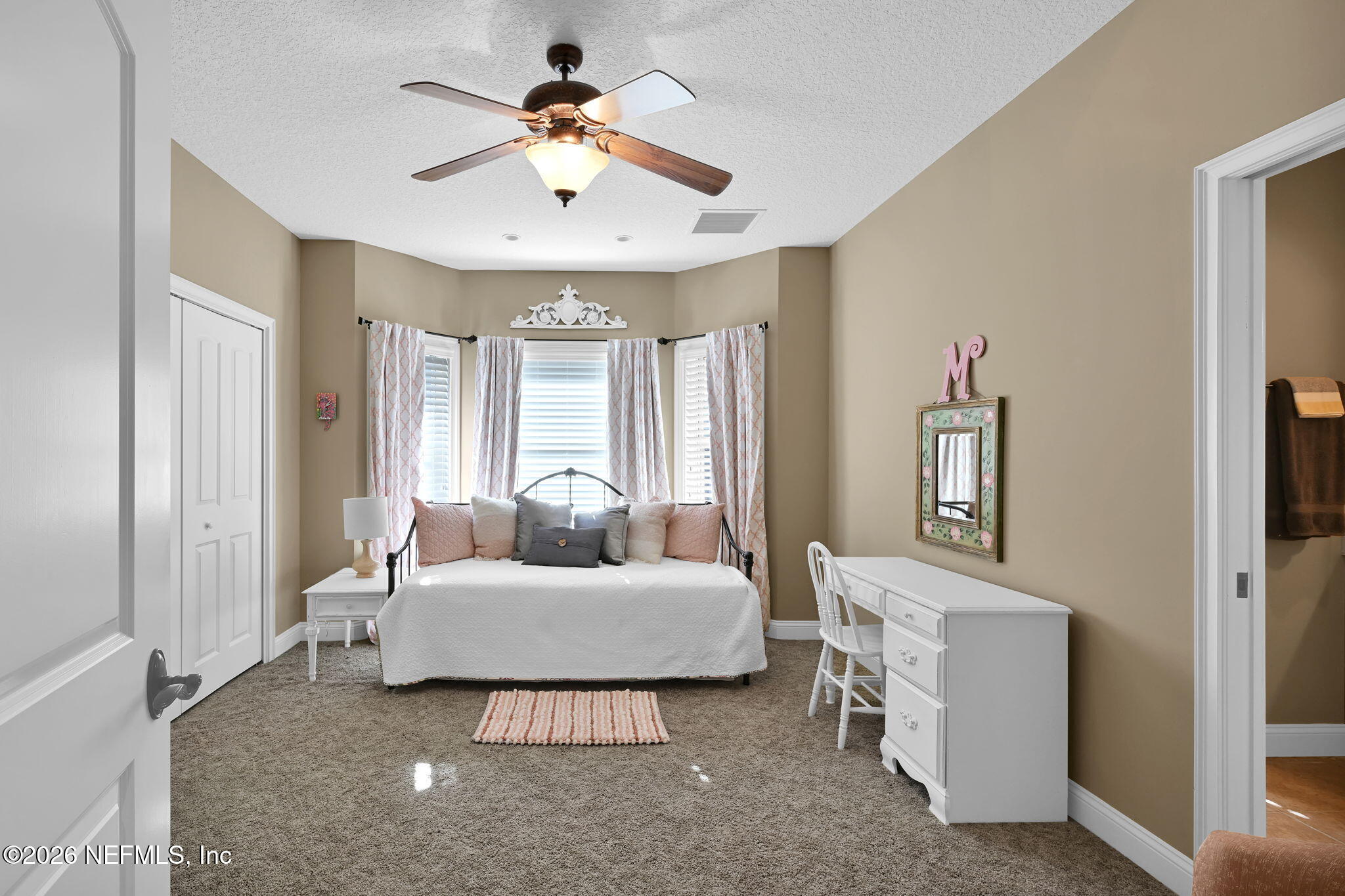 1050 Popolee Road St. Johns, FL 32259 - Photo 26 of 37 a living room with furniture and a window