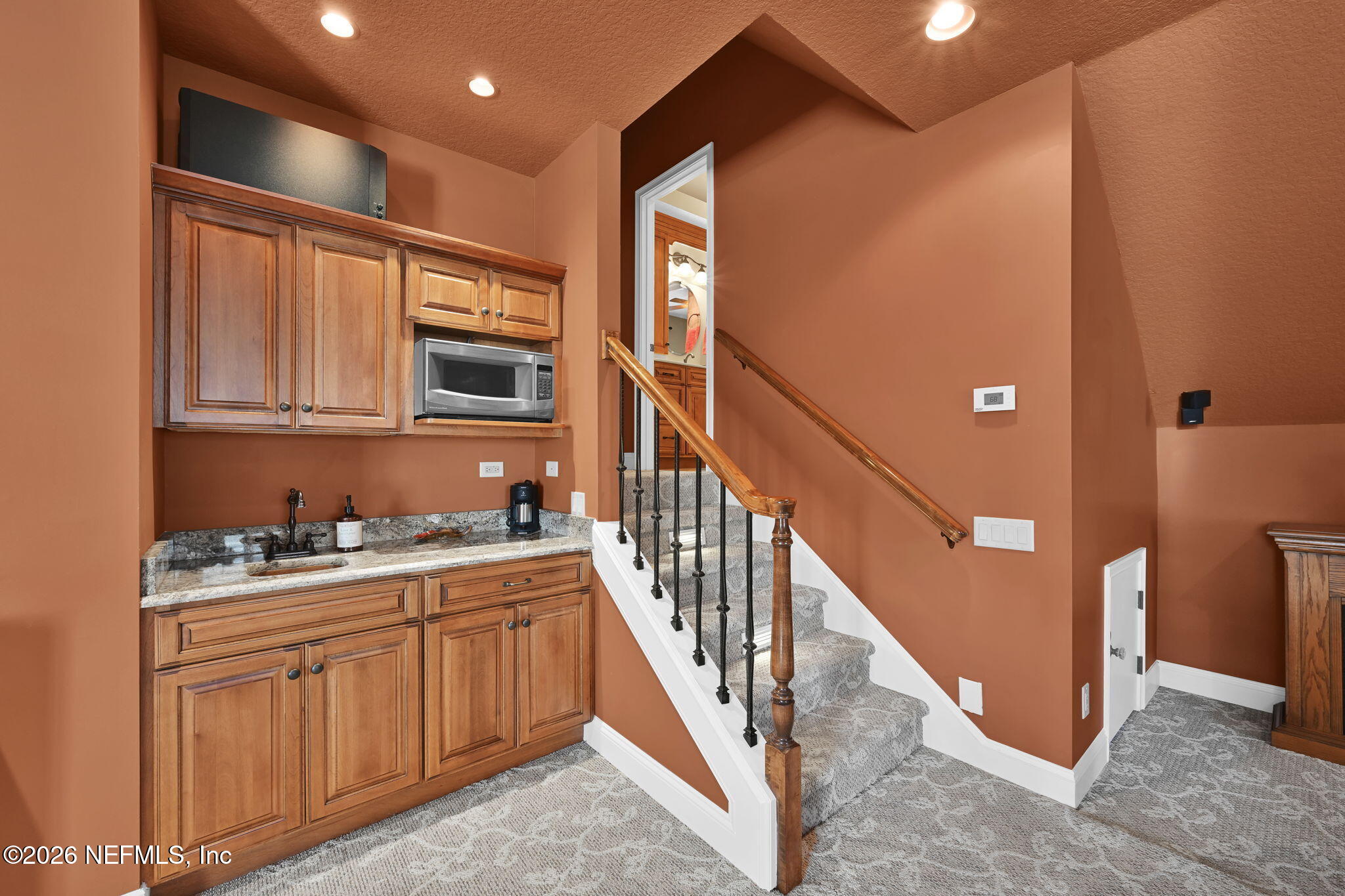1050 Popolee Road St. Johns, FL 32259 - Photo 32 of 37 a hallway with cabinets