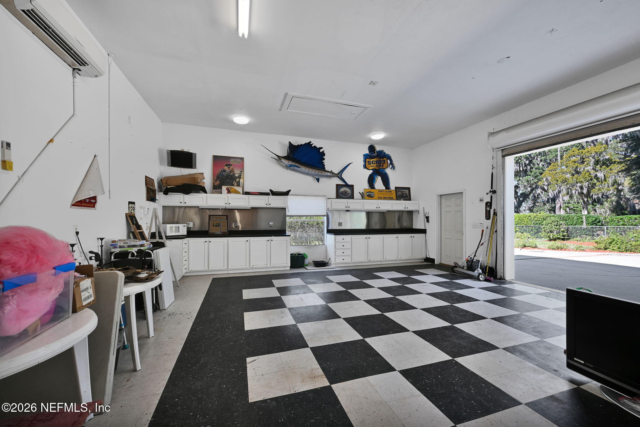 1050 Popolee Road St. Johns, FL 32259 - Photo 34 of 37 a kitchen with stainless steel appliances granite countertop a refrigerator and a stove top oven