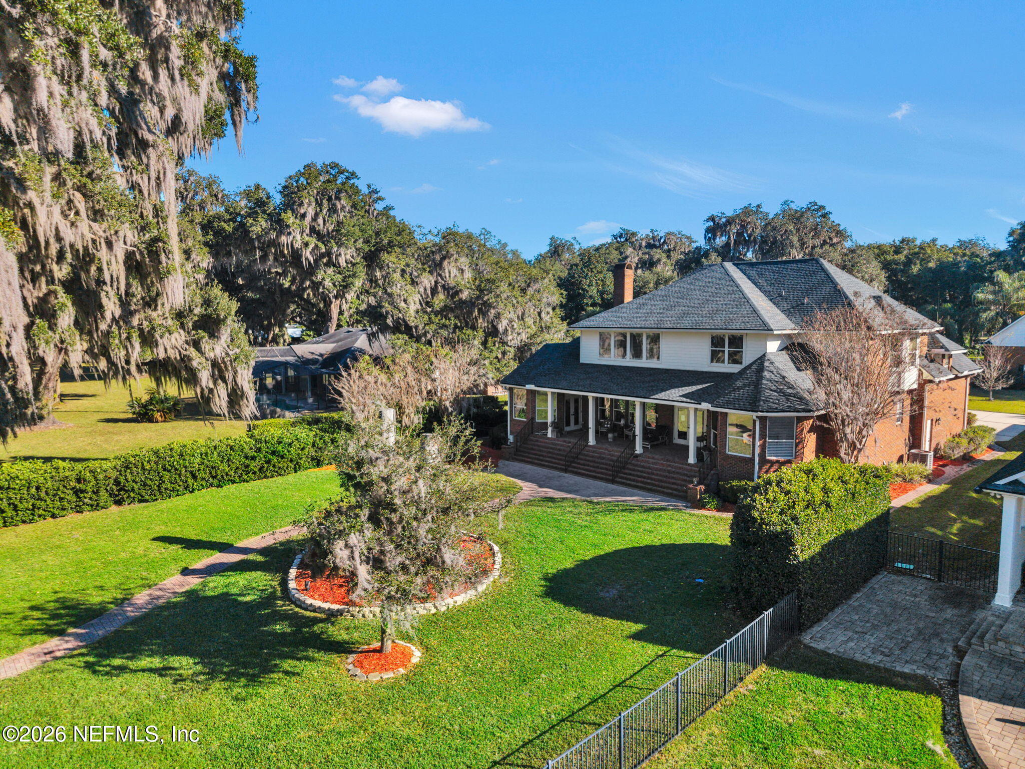 1050 Popolee Road St. Johns, FL 32259 - Photo 36 of 37 a front view of a house with a garden