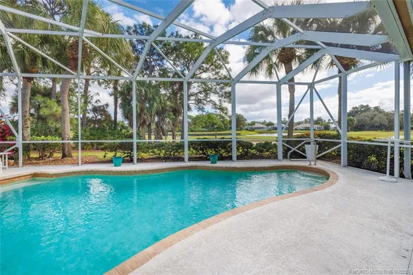 a view of an outdoor space with furniture