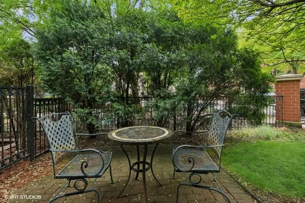 a view of a table and chairs in patio