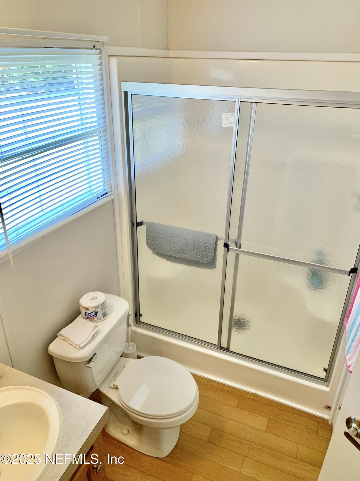 12752 Southeast 9th Place Gainesville, FL 32641 - Photo 36 of 53 a bathroom with a toilet and a shower