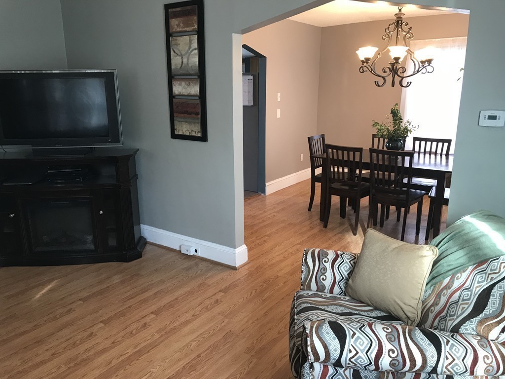 15 Strong Street Springfield, MA 01104 - Photo 8 of 28 a view of a livingroom with furniture and wooden floor