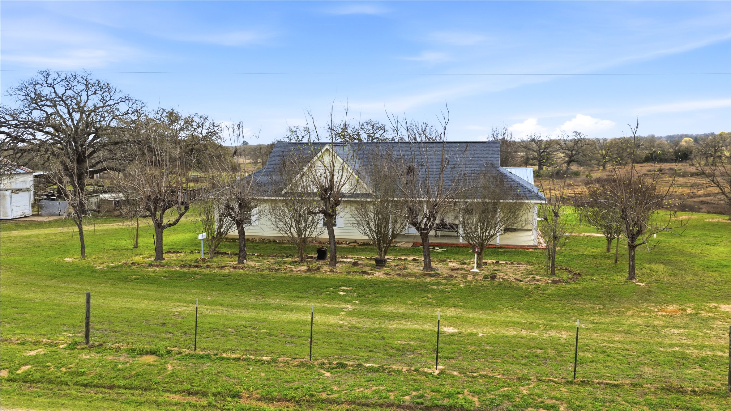 369 Young School House Road Smithville, TX 78957 - Photo 24 of 30 View of property exterior with a yard